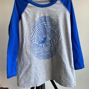 Threadless middle length sleeve blue and gray shirt with an OCTO print graphic